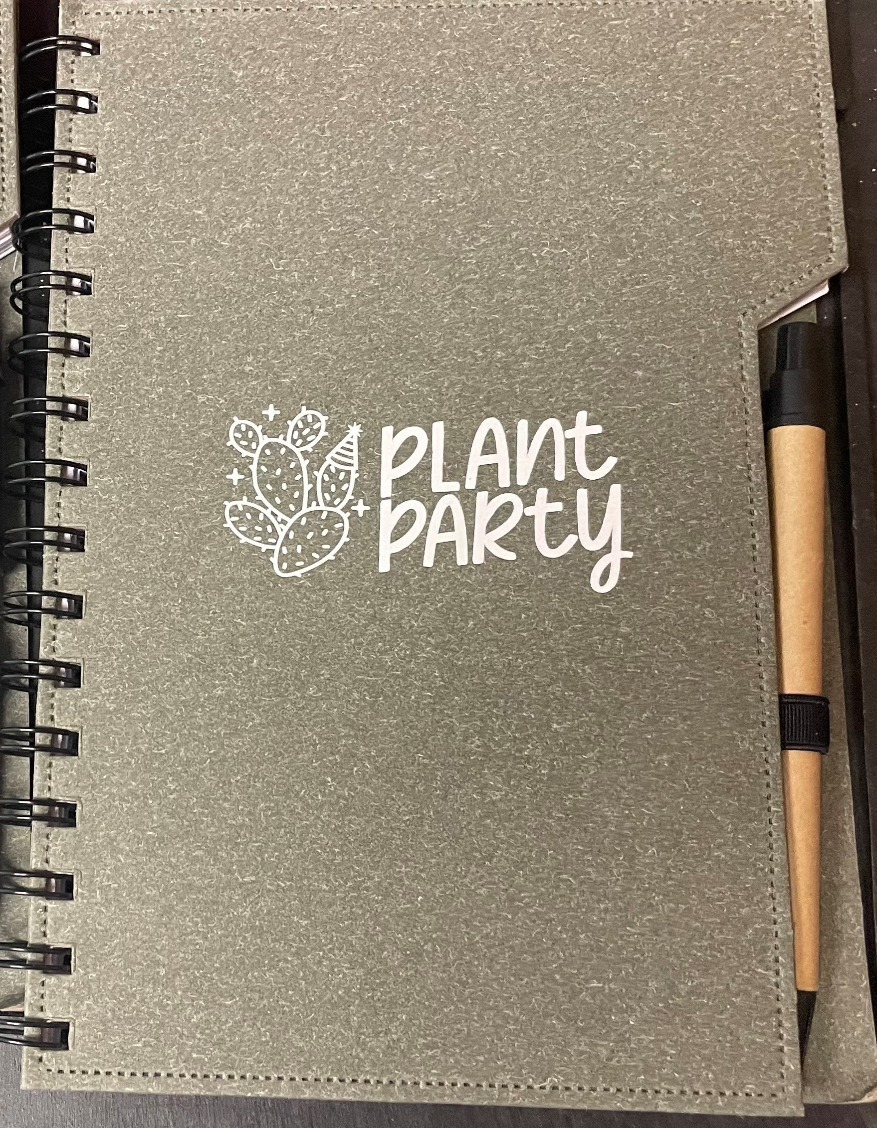 Plant Party blank journal with sticking tabs for marking and a pen